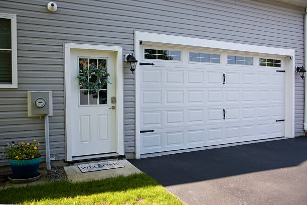 24/7 Emergency Garage Door Panel Replacement experts in Yates Center, KS